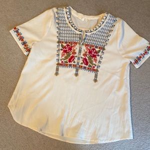 Cream short sleeve shirt with embroidered detail